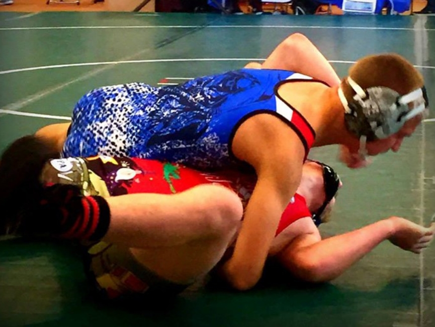 Two men wrestling