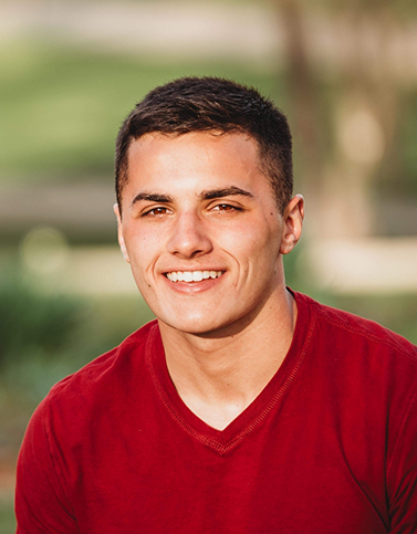 Smiling boy with red shirt